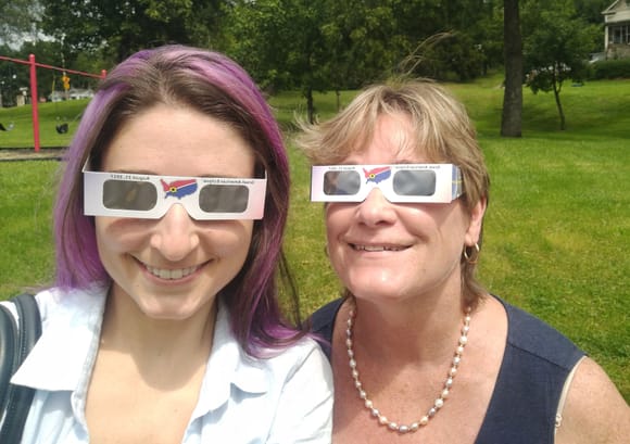 When we got to a little park in Excelsior Springs, Missouri it looked like a normal day but once we put on our glasses we could see that the sun already had a tiny ellipse on it.