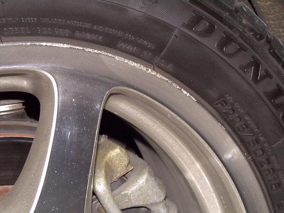 Additional curb rash right rear