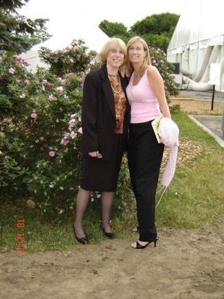me and mom at jjs grad.jpg