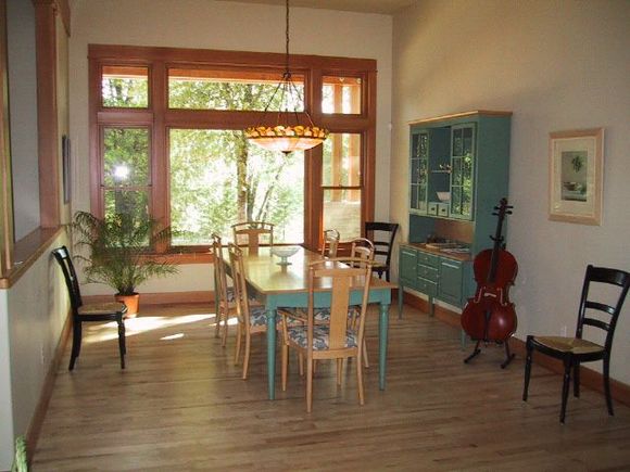 Dining Rm sans wall paper and window coverings