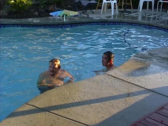 Rob and Donnie plotting in the pool.JPG