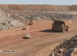 1303234680 huge truck goes over smaller truck