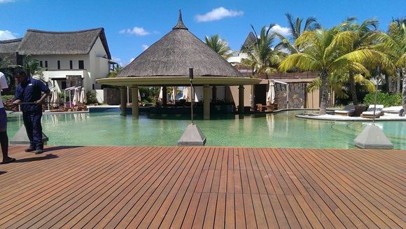 hotel pool thatched roofs