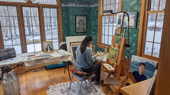 note how she carefully incorporates the knife and palette to mix her oils to achieve the desired color. 