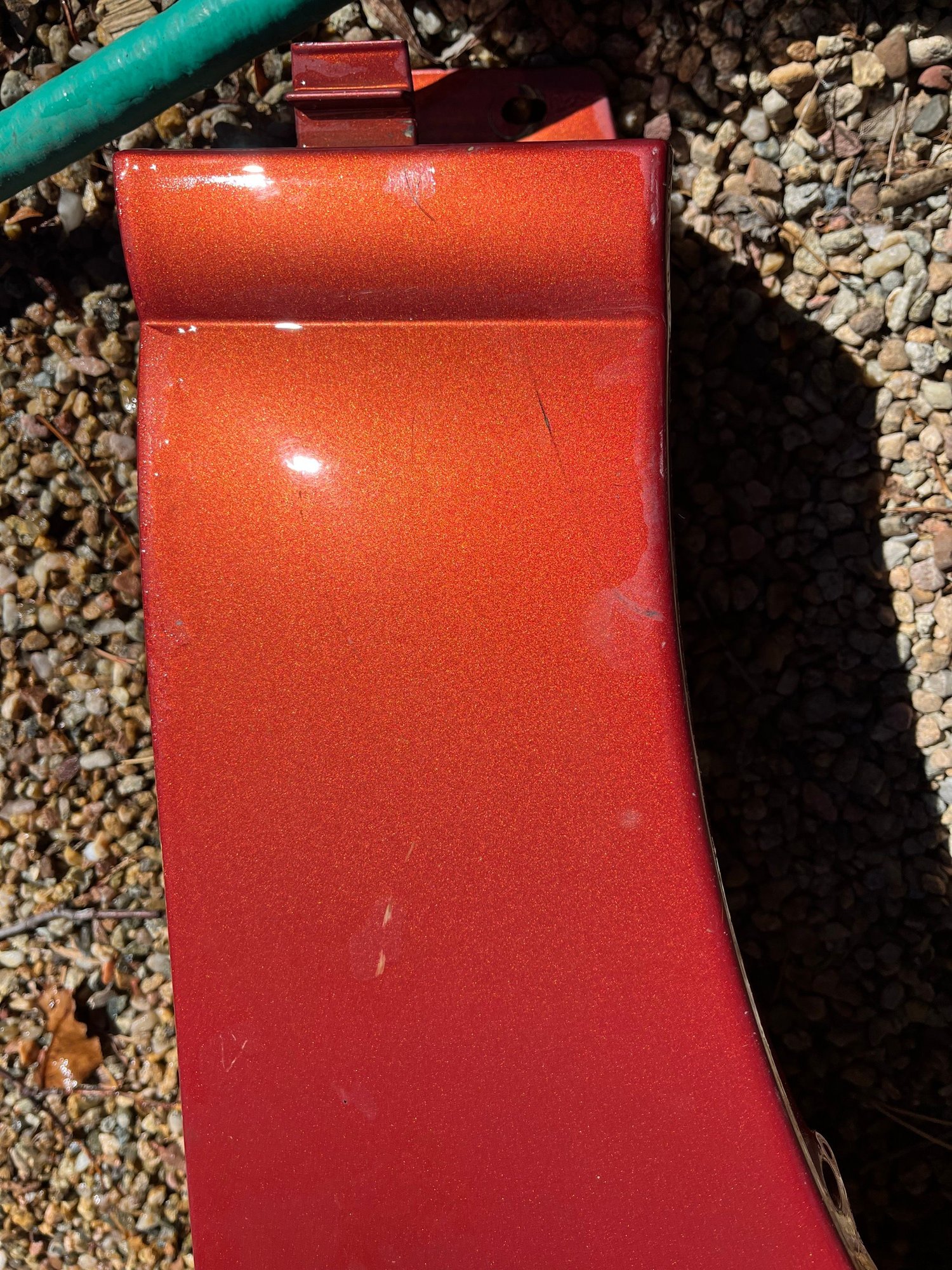 Yellow scuffs look surface only. The little t post at the top is also intact, usually broken off by heavy handed removal.