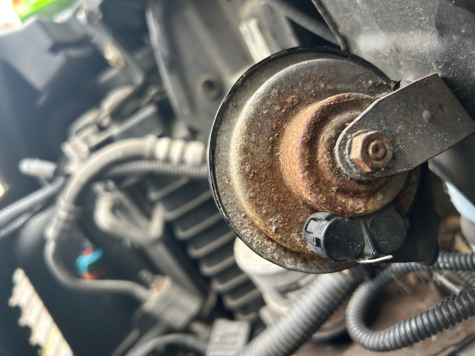 Back of horn , I do see the (A,B)  sensor/connector is broken 