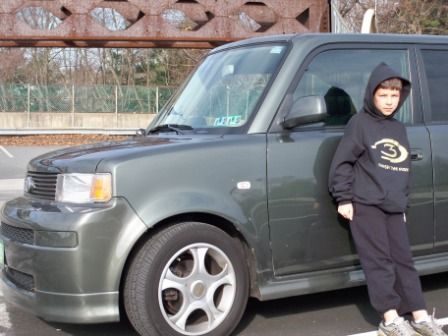 My youngest child with my favorite car!