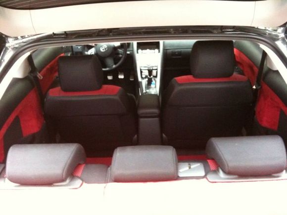 Red suede interior and yes the hatch cover is red too. Lol