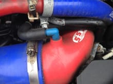 red pipe/ blue connection pipe to turbo inlet.
The metal head breather pipes had to be replaced with the installation of the Grimmespeed top mount