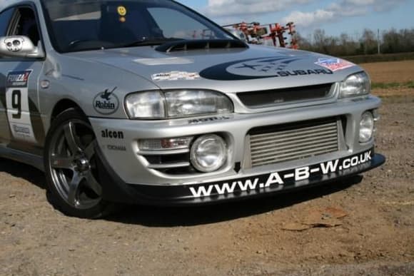 Time Attack Type Splitter added April 09
OEM Scoop painted satin black and refitted