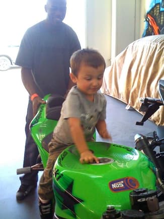 my son playin on JBs bike