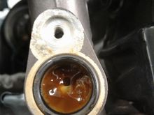 This wasn't mine but if you suction the fluid out and remove your cup and see this, you know the entire system needs rehab.