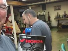 So last night Ducati Tuner/Builder/Restorer extrodinaire Mike Weber took time out of his mega busy schedule to press fit the water pump impeller back into my VTR1000F engine case.  At the end I thanked him for his help and tried to take a celebratory selfie of us while holding up the Honda manual!  Mike was having none of that and so, dropped the clutch, pulled a u-ey and started to exit the frame!  Too slow Duc man, too slow!  Hahahahahahaha!