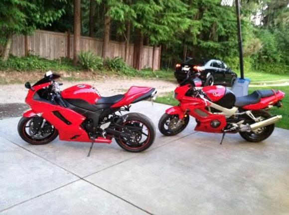 This is my 996 and my Godsons Kawasaki ZX6R.
Also his nice Audi in the background.
Great Kid.
Star Student and Football player.
 Sweet!