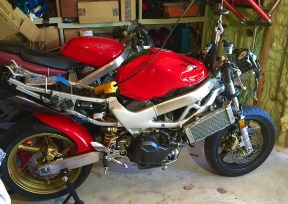 Finally a lull and I can back to working on my VTR! Got it spun around this weekend I will try and strip the entire front end off of it and get to work on the fork restore/rebuild/revalve/re-spring and the minumetal task of cleaning off all the road sealer from the front of the engine and chassis... Onward!