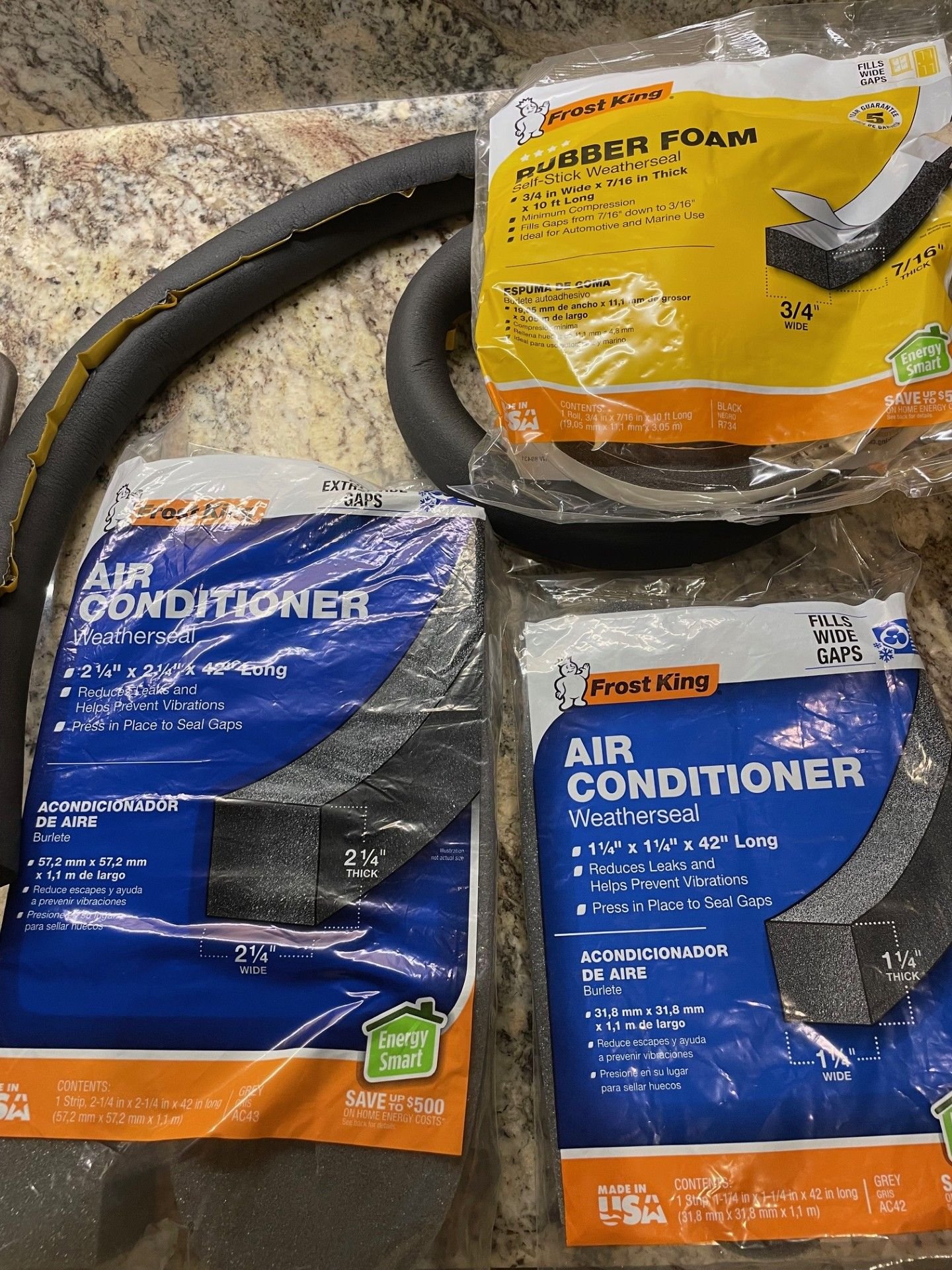 The blue packages are lightweight, open cell foam.  The black tubing is more dense, closed cell foam for hot water pipes.