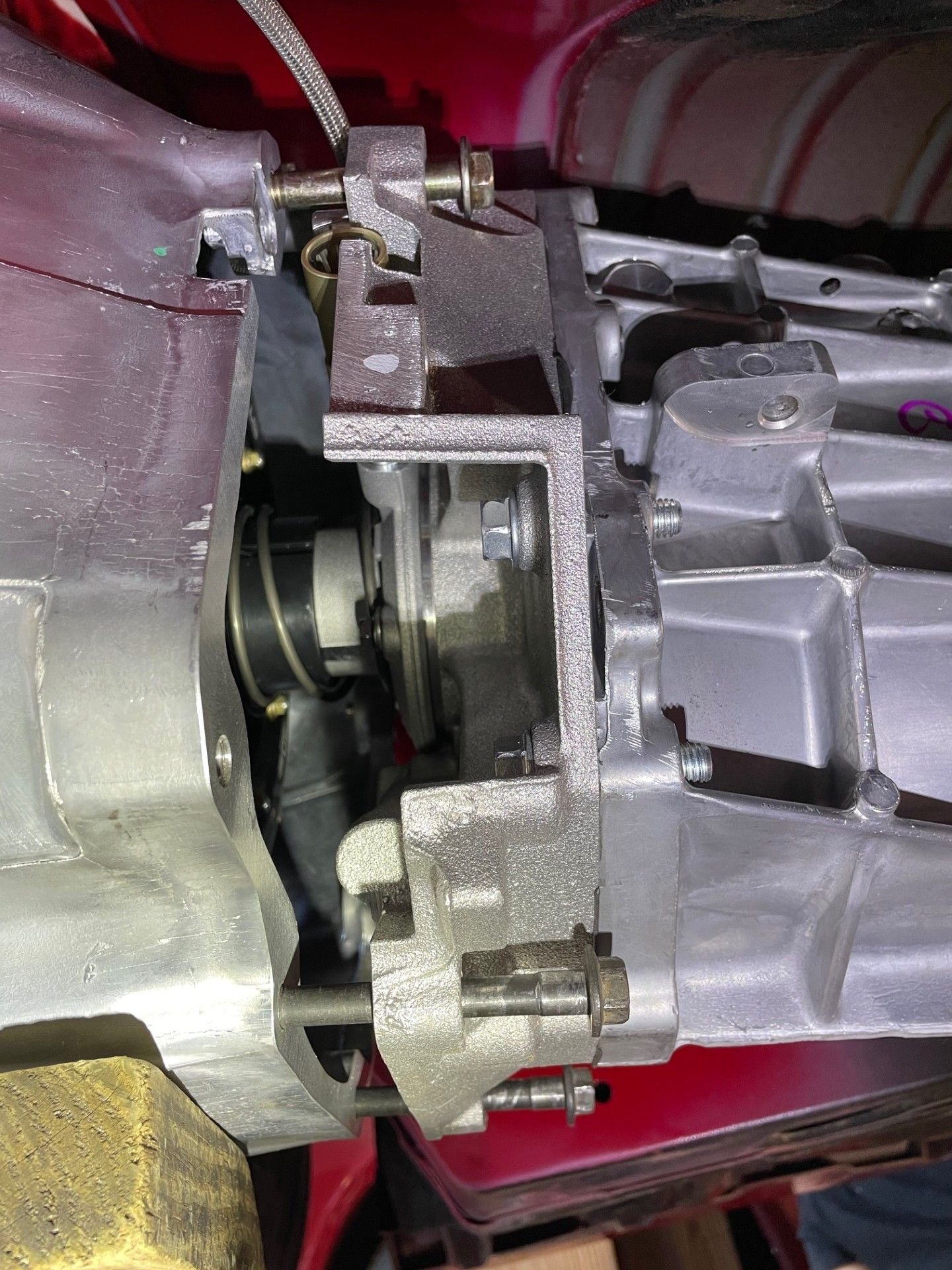 I'm using long bolts to make sure the transmission is lined up with the engine/bellhousing.  I AM NOT trying to pull the transmission to the engine with these bolts!  They're only there for support and alignment!