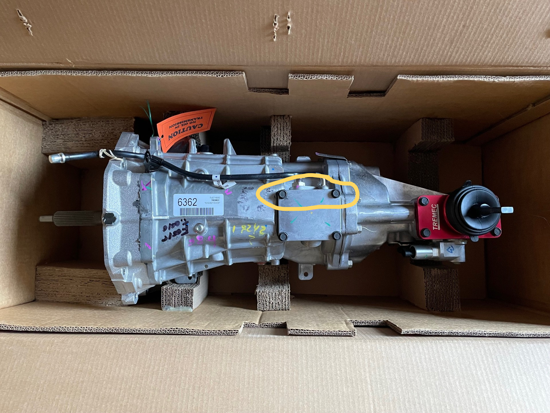If you compare this photo to the non-F Magnum in post #4, you can see that this circled area is well forward of the shifter vs the non-F Magnum.