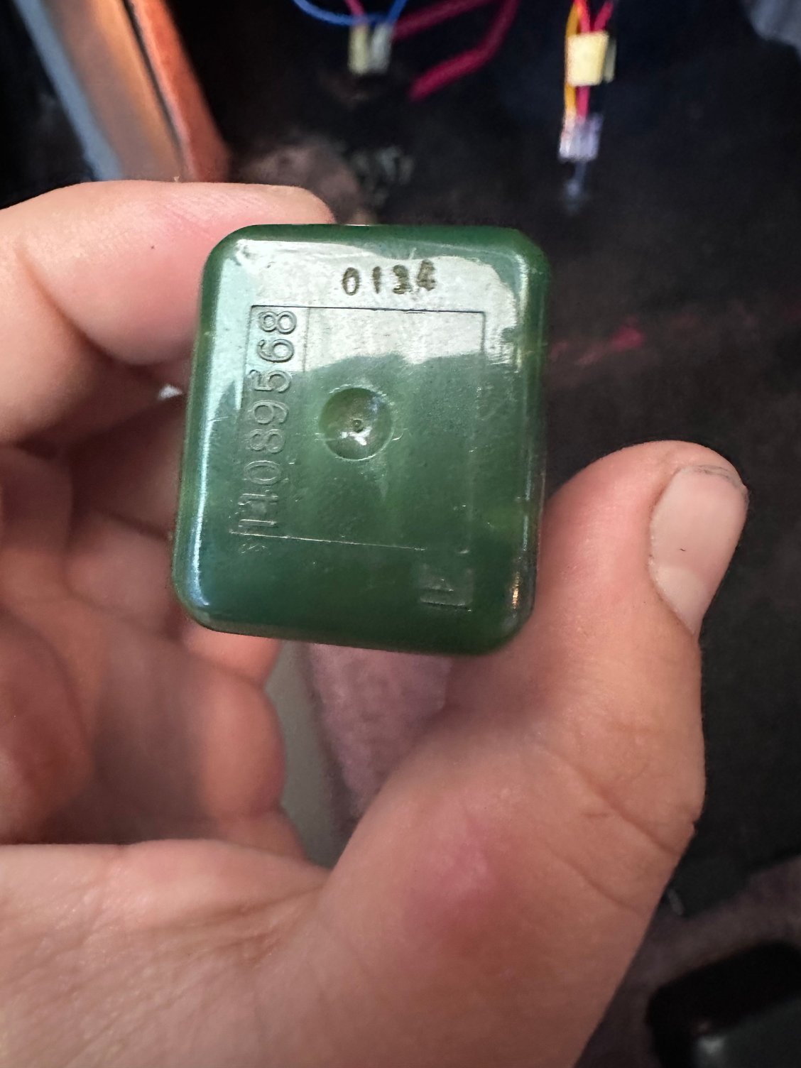 The relay , part numbers visible 