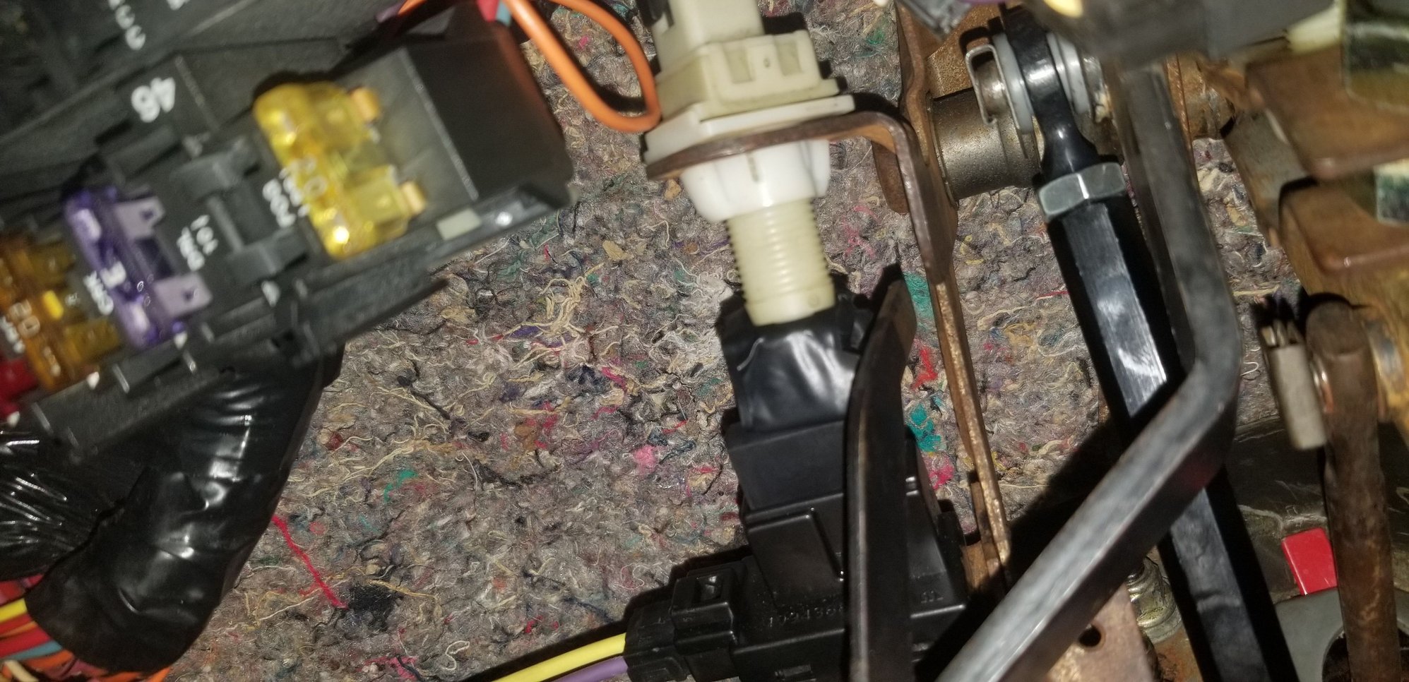 Pedal not pressed, switch pushed in, circuit is complete, cruise will work