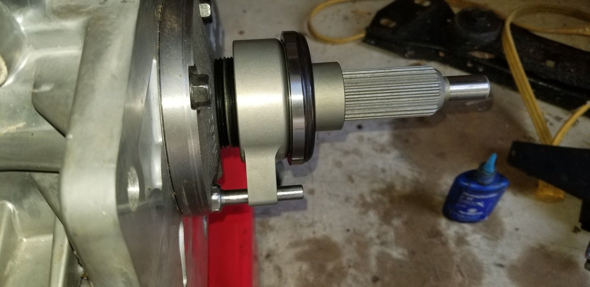 My final shim stack, which got the air gap to 0.216in.  Check and make sure that the bearing can travel fully on the pin.  This pin DOES clear the pressure plate btw, no trimming required! 