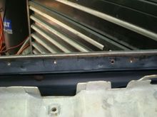 Passenger door, the door frame is original but it was reskinned in 88 or 89. They never bothered to repaint this area.