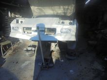 Cribbing out but the high lift jack it too tall once compressed it still wont come out from under the car so I have to put something under the wheels and then swap jacks.