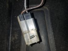 Diode wired in series between bulkhead connector and choke heater relay.  Current cannot flow from alternator back to the relay.
