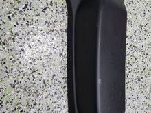 Im looking for a trim panel without this bulge. The bulge is for rear wiper motor that I'm taking off car.