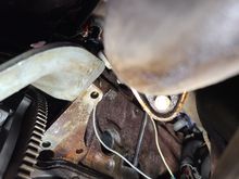 Clearly significant rust on engine block mounting surface.