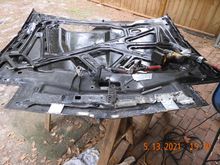 Ground down the POR15, enough to weld in new metal to plug holes and hopefully regain structural strength.  