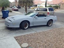 Putting in new carpet reupholstering seats new top and tires deciding to stick with red or paint white