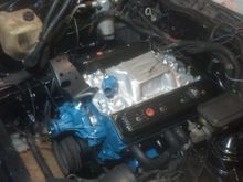 After applying a shoehorn and copious amounts of Vaseline, the new engine is in!