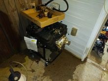 Engine long block sold as core... Jegs stand can be included for $25 will pull intake when I sell it leaving it on to keep dry.  Looks like some oil bypass on front passenger plug and a couple header studs need drilled out.  Water pump included it's the cheap auto parts store version.