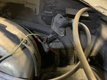 The vaccum valve/switch thing with vacuum hose to engine