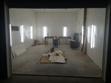 12 LED lights, 9000cfm fan, piped in air with desiccant filtration, added a wall with entry door/ sight window
