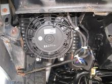 transmission cooling fan mounted under battery box