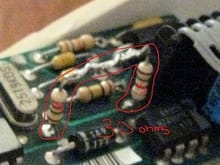 Two 15ohm resistors to make 30-30.2 ohms of resistance and to replace the old bad 30ohm resistor