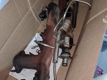 I cut the Air tubes because they were just in the way. I bought Smog Legal parts so these are never going to need to go back in. 