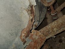 Driver side wheel well rusted area