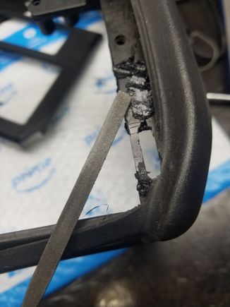Used a needle file to carefully enlarge the hole foe the faceplate clip.