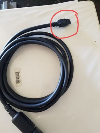 Plug that connects to the command module inside the cabin.  Larger than the cable diameter.