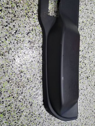 Im looking for a trim panel without this bulge. The bulge is for rear wiper motor that I'm taking off car.