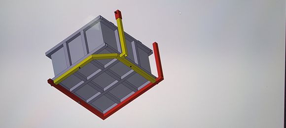 Yellow part is removable for cell cage installation. 