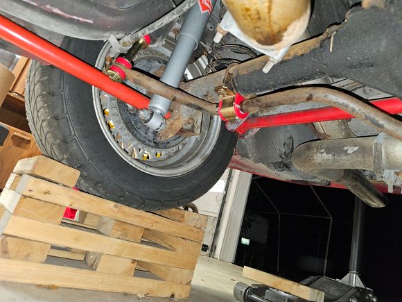 Spohn rear control arms and panhard bar. KYB Excel shocks. Energy suspension 24mm bushings on the stock bar. 