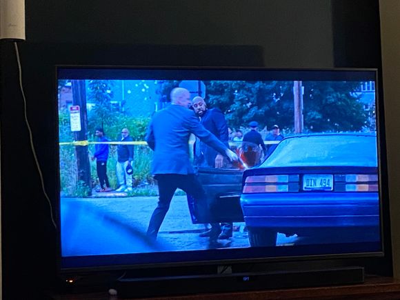 Mayor of Kingstown, semi ratty third gen Camaro with a huge cowl induction hood gets shot up and guy inside mauled to death by a dog.