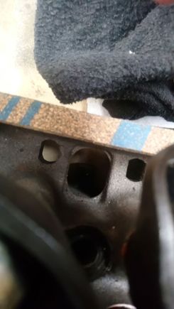 You can see the difference between the oil hole on this head compared to the next pic
