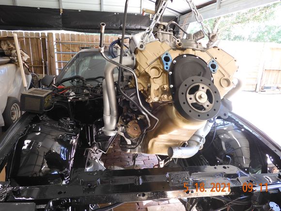 Realized that TL was right, no way to keep 
the whole Y pipe installed and hope to get the engine in.  Removed half