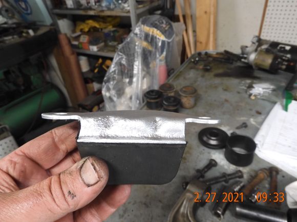 The rubber on this stop was hanging by a band-aid of rubber ligament.  I tried to order a new one to no avail so I cleaned up the bracket and wire wheeled the rubber to remove the crappy oxidized layer, then used black RTV to reattach the rubber, better than new!