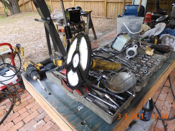 This sucker is bad a$$, adjustable flaps, and so bright, the sun has to turn away.  Reminds me of the alien eye from War of the worlds. The 3 panels are adjustable, way more lumens than I will ever need.  Just need to incorporate the hook from my old drop-light.  